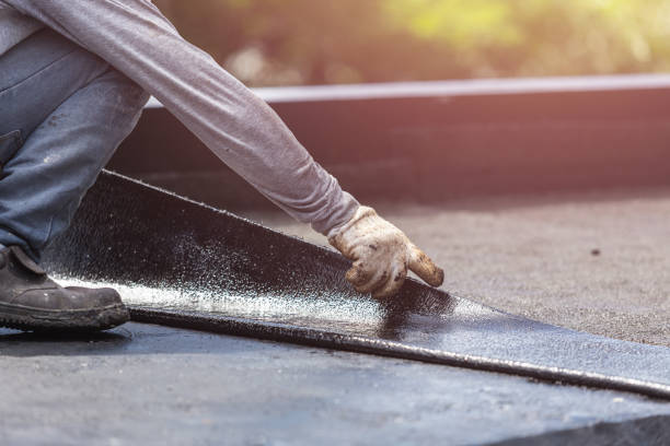 Professional Basement Waterproofing technician working in Unionville, PA